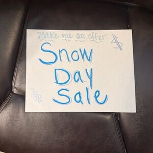 Blue Handwritten 'Snow Day Sale' Sign